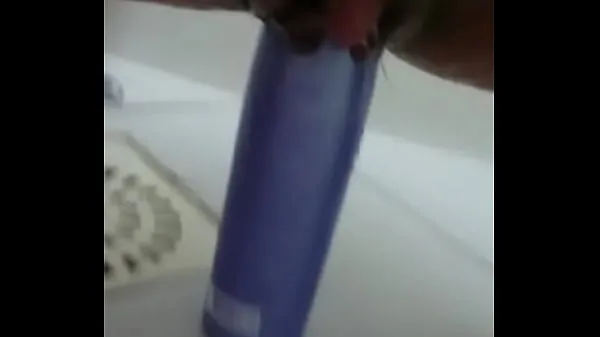 Best Stuffing the shampoo into the pussy and the growing clitoris mega Clips