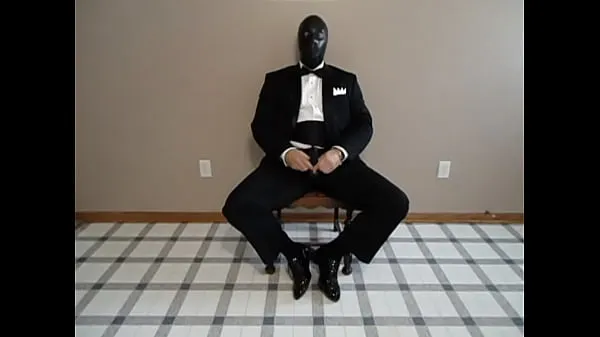 Seated in a tuxedo wearing a rubber cock and ball sheath and playing with my cock until I cum Klip mega terbaik